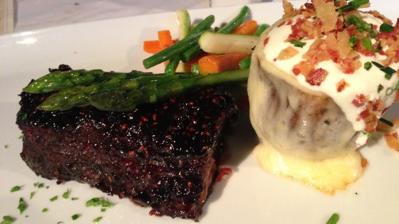 Center Cut Short Ribs served with a raspberry-chipotle glaze, and the baked potato